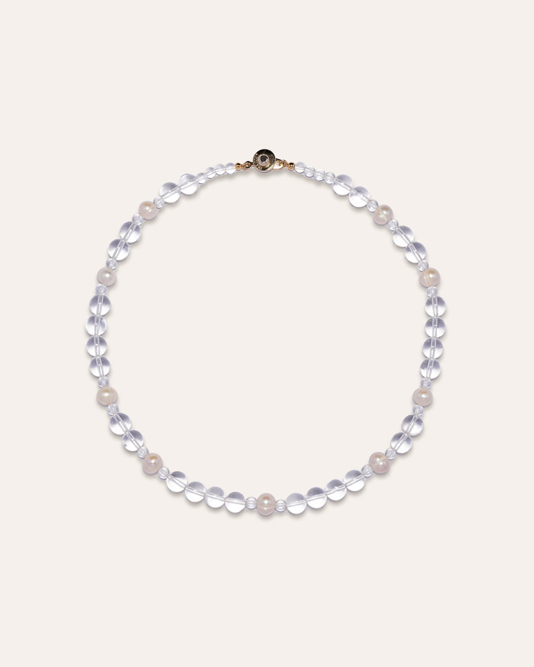Elegant Eterna Nova necklace featuring clear quartz and freshwater pearls, showcasing the beauty and simplicity of these semi-precious stones. A versatile accessory that combines style with spiritual significance.
