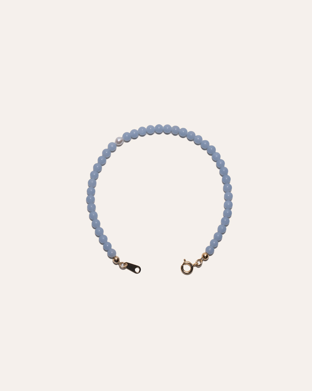 Gem & One bracelet featuring angelite and freshwater pearl beads.