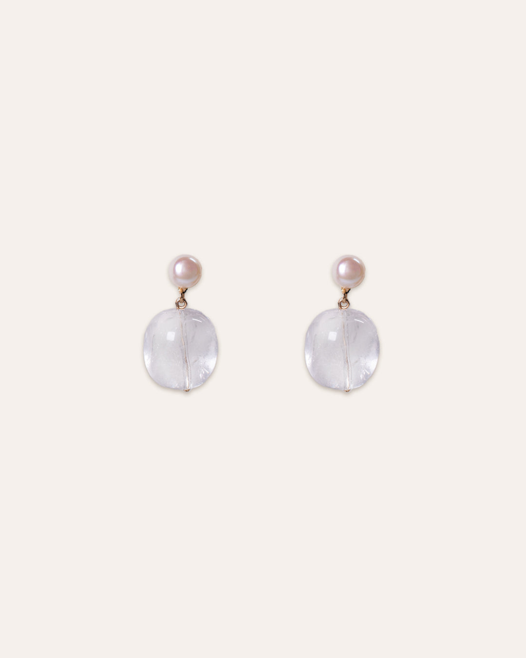 Glacial earrings featuring freshwater pearls and clear quartz beads.