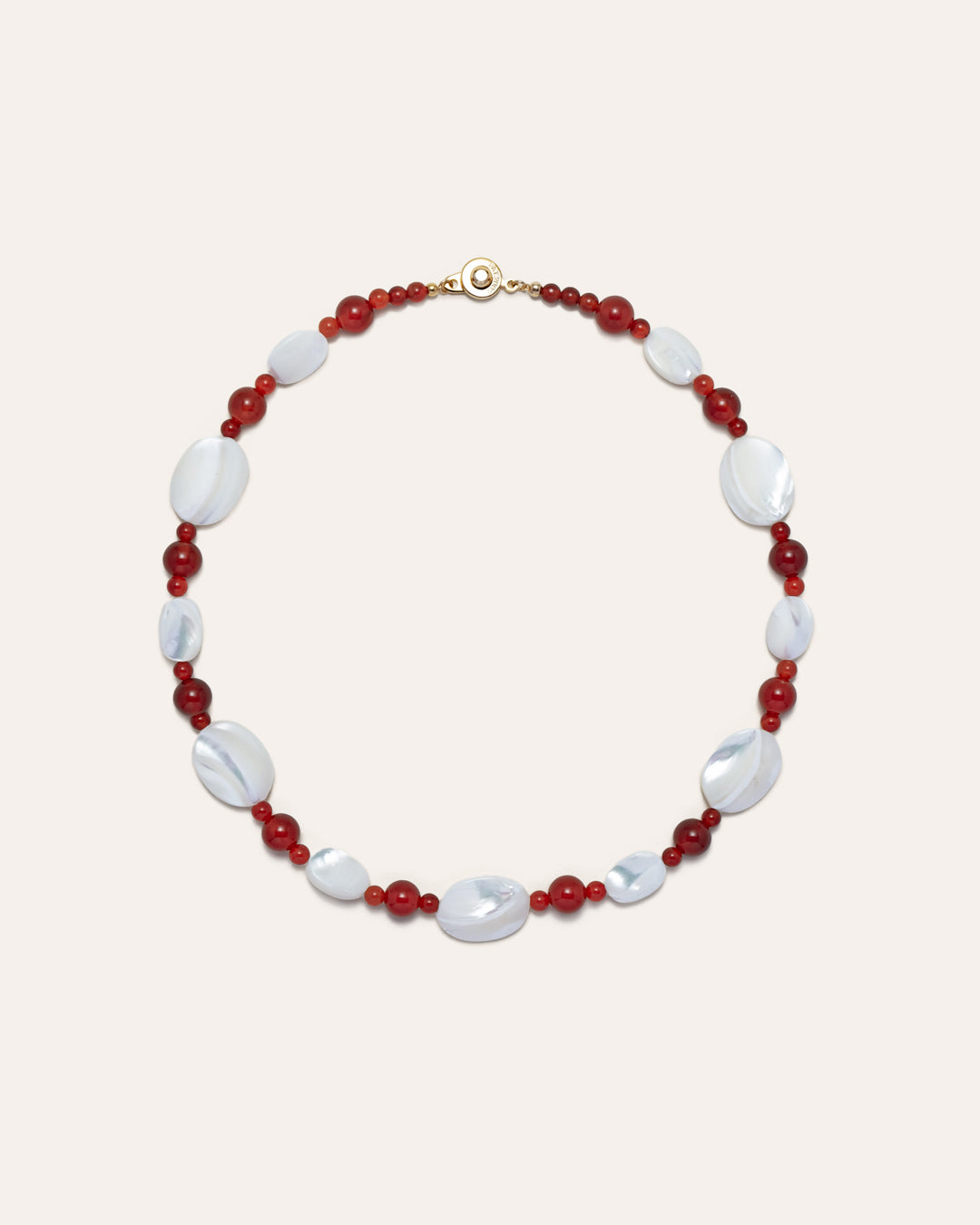 Mother of pearl and red agate Sonata Moonlit Necklace, elegantly showcasing natural stone beads in a necklace setting.