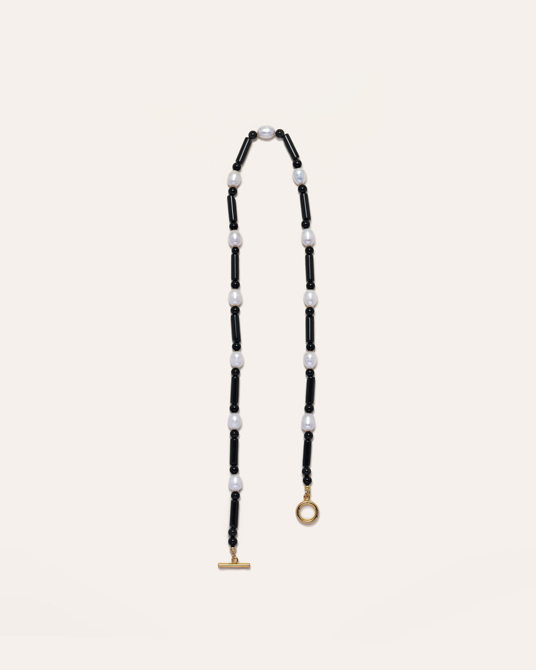 Freshwater pearl and onyx Starry necklace. Elegant jewelry featuring a captivating design, perfect for special occasions or everyday wear.