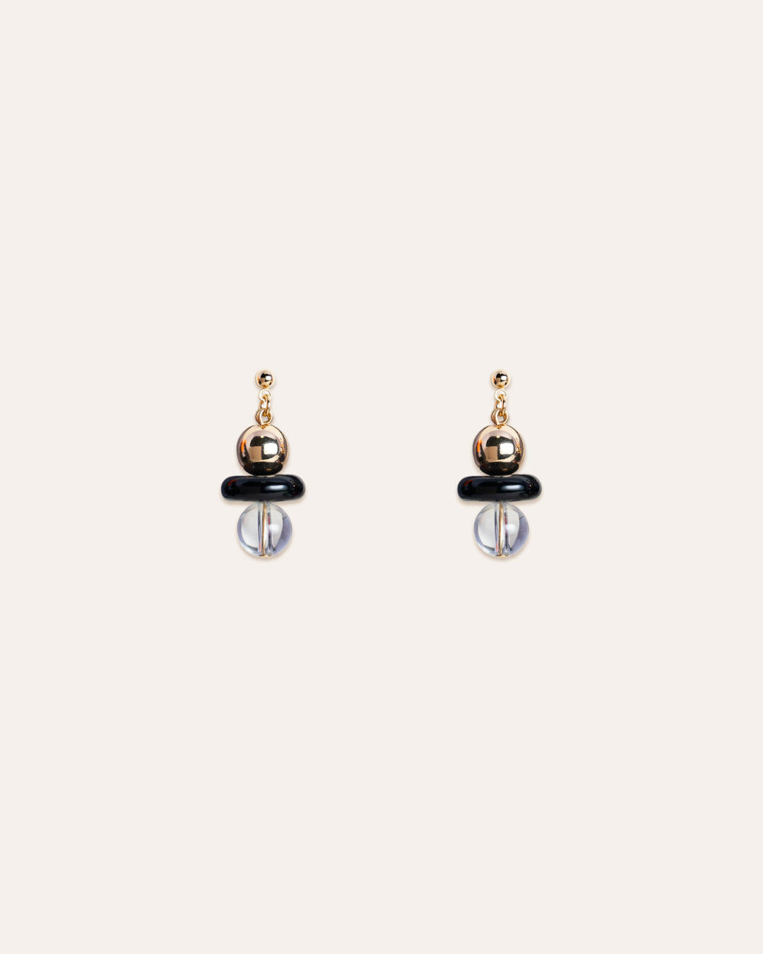 Stylish 14k gold vermeil earrings featuring clear quartz, onyx beads, designed to add a touch of elegance and sophistication. Perfect for a variety of occasions and styles.