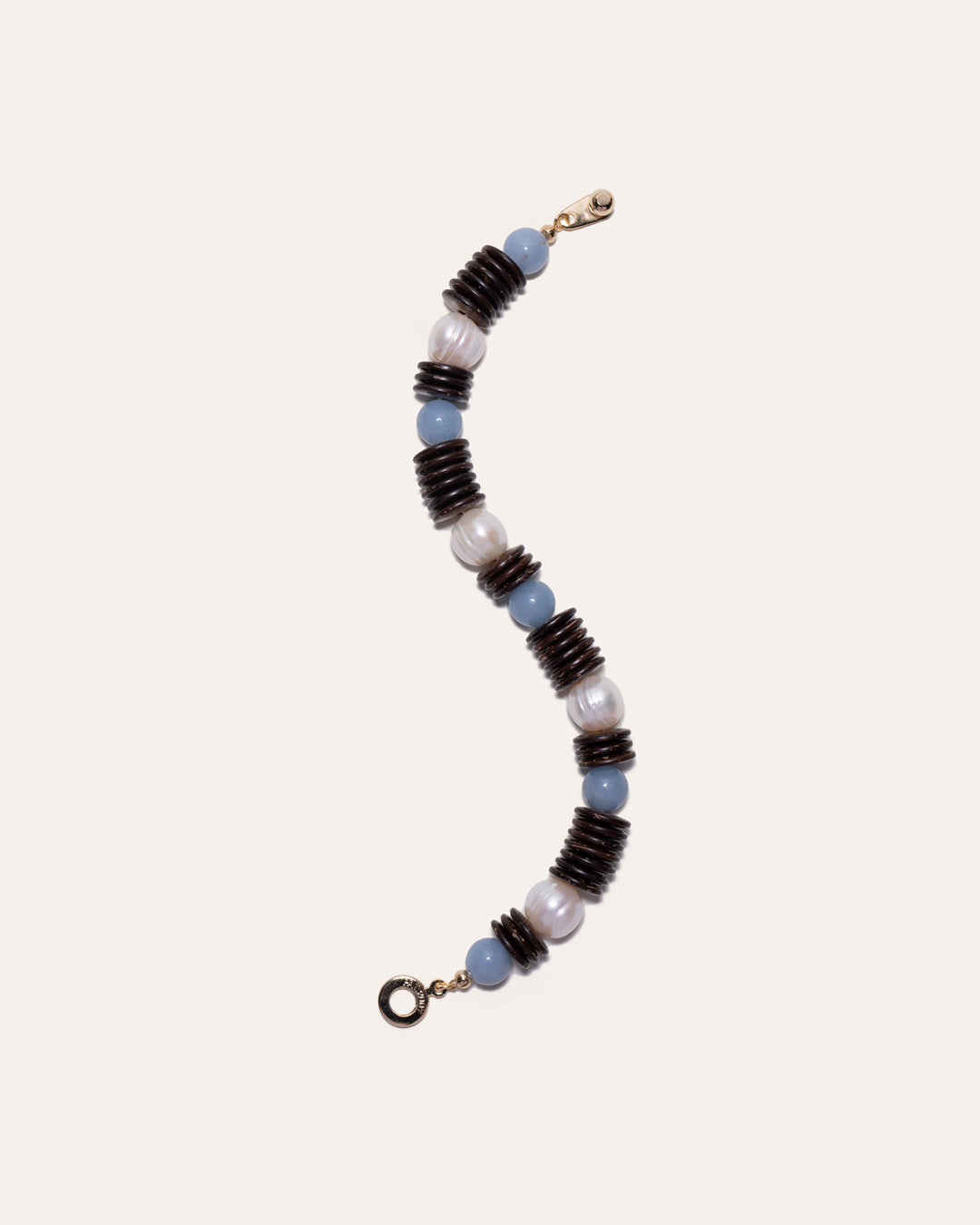 Toes-In-Sand bracelet with coconut disc beads, angelite, and freshwater pearls.