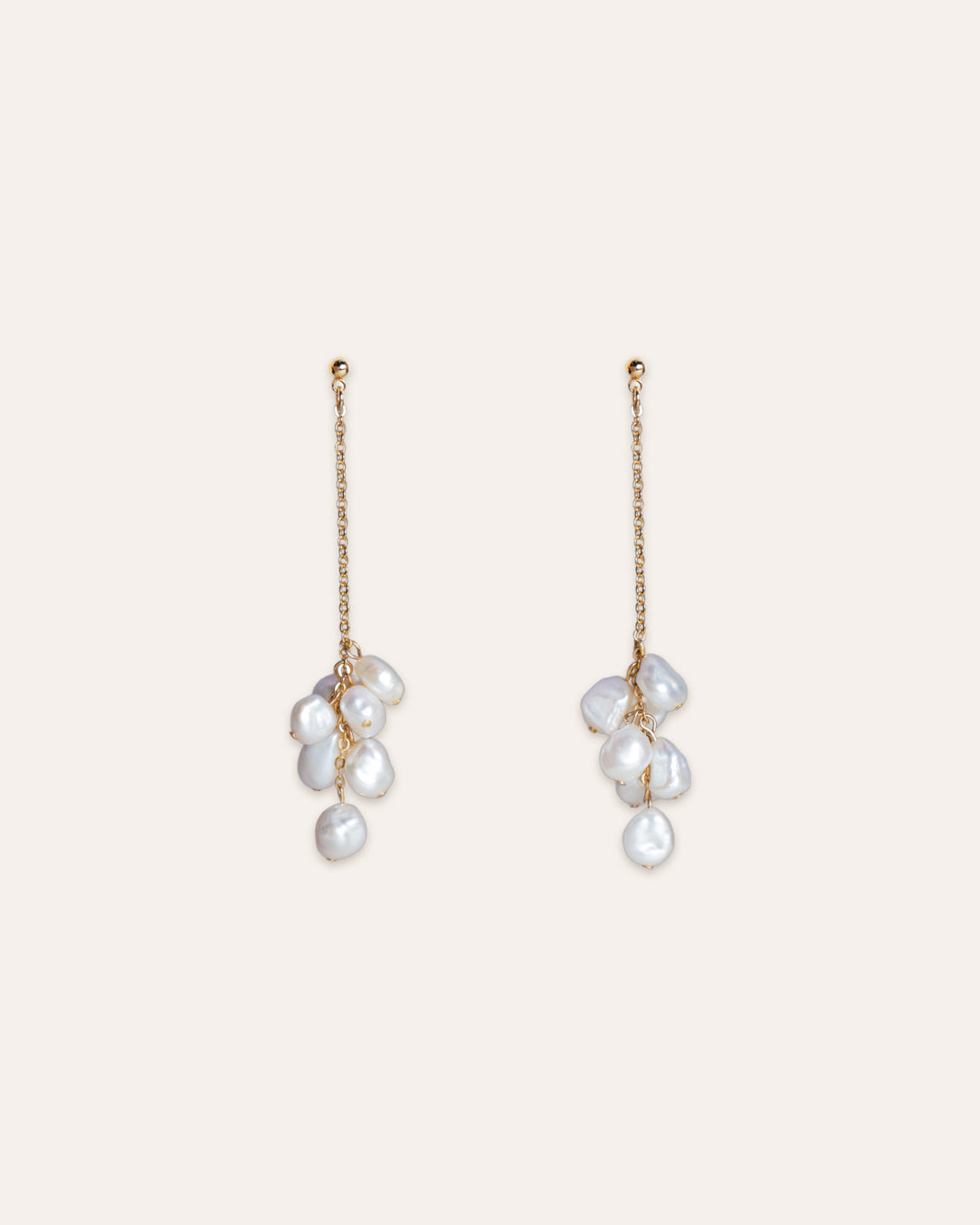 Freshwater keshi pearl earrings featuring gold vermeil chain, elegant floral design adorned with lustrous keshi pearls, perfect for jewelry lovers and fashion enthusiasts.