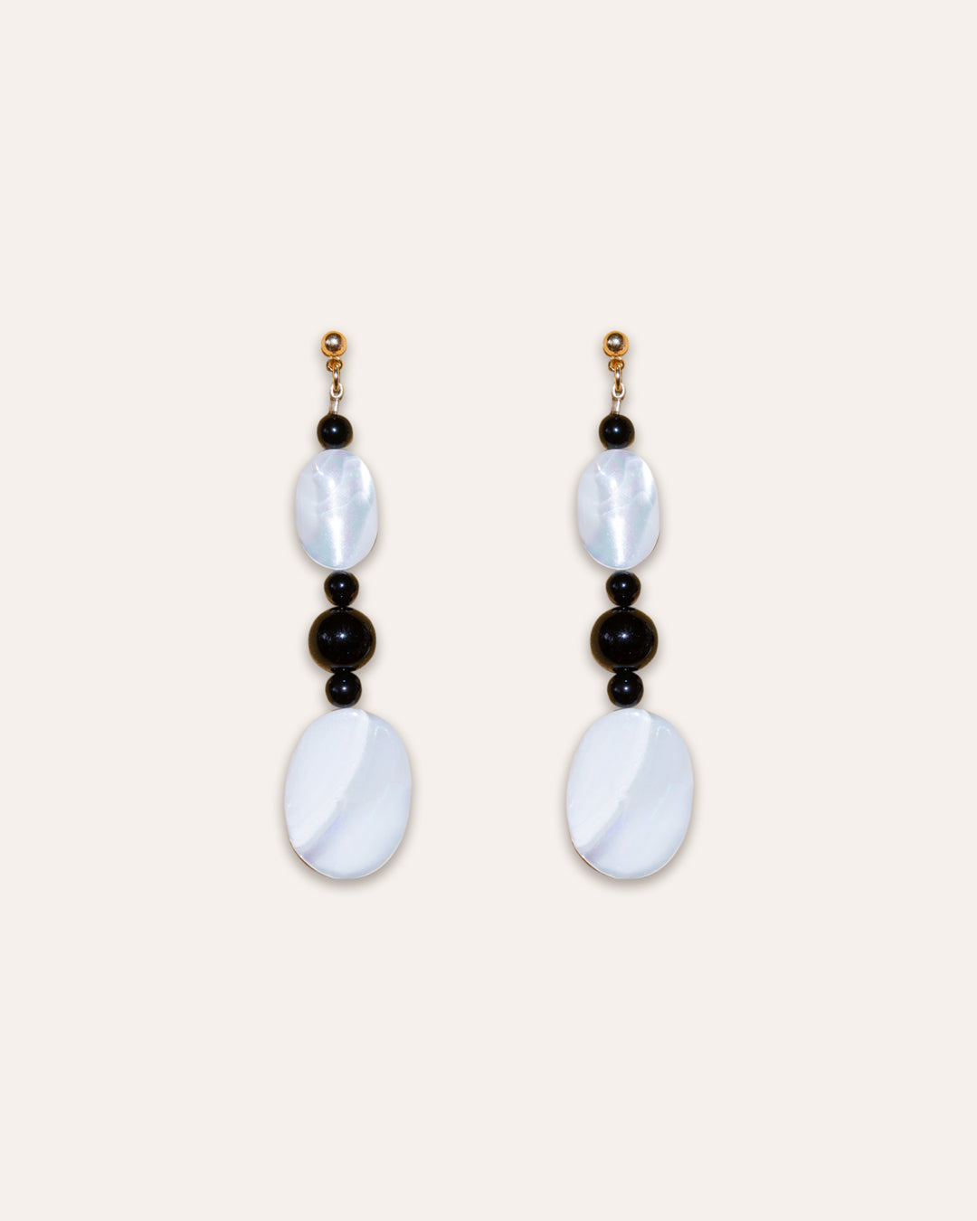 Studio shot of Moonlit Earrings Onyx - Mother Of Pearl (MOP) and Onyx beads.
