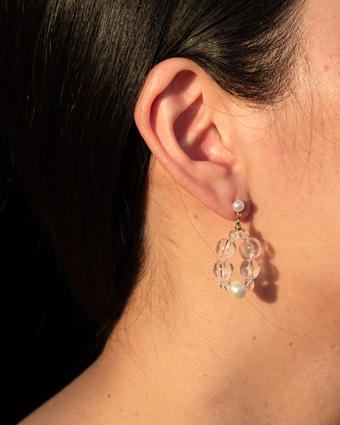 Clear Quartz Eterna Nova Earrings(small) with Freshwater Pearls: A pair of sparkling small earrings, perfect for everyday wear, showcasing elegant freshwater pearls and vibrant clear quartz.