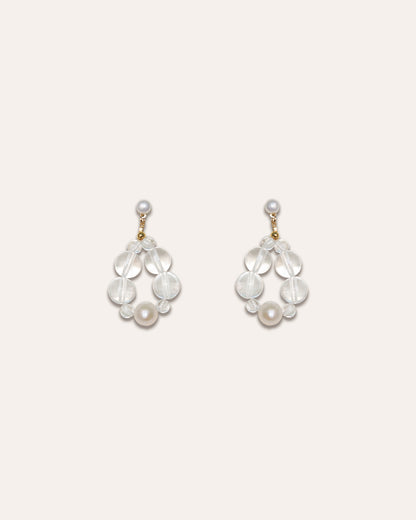 Studio shot of the Eterna Nova earrings in Freshwater pearl and clear quartz.