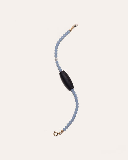 Gem & One Rooted bracelet with oval dark rosewood bead, angelite, and freshwater pearl.
