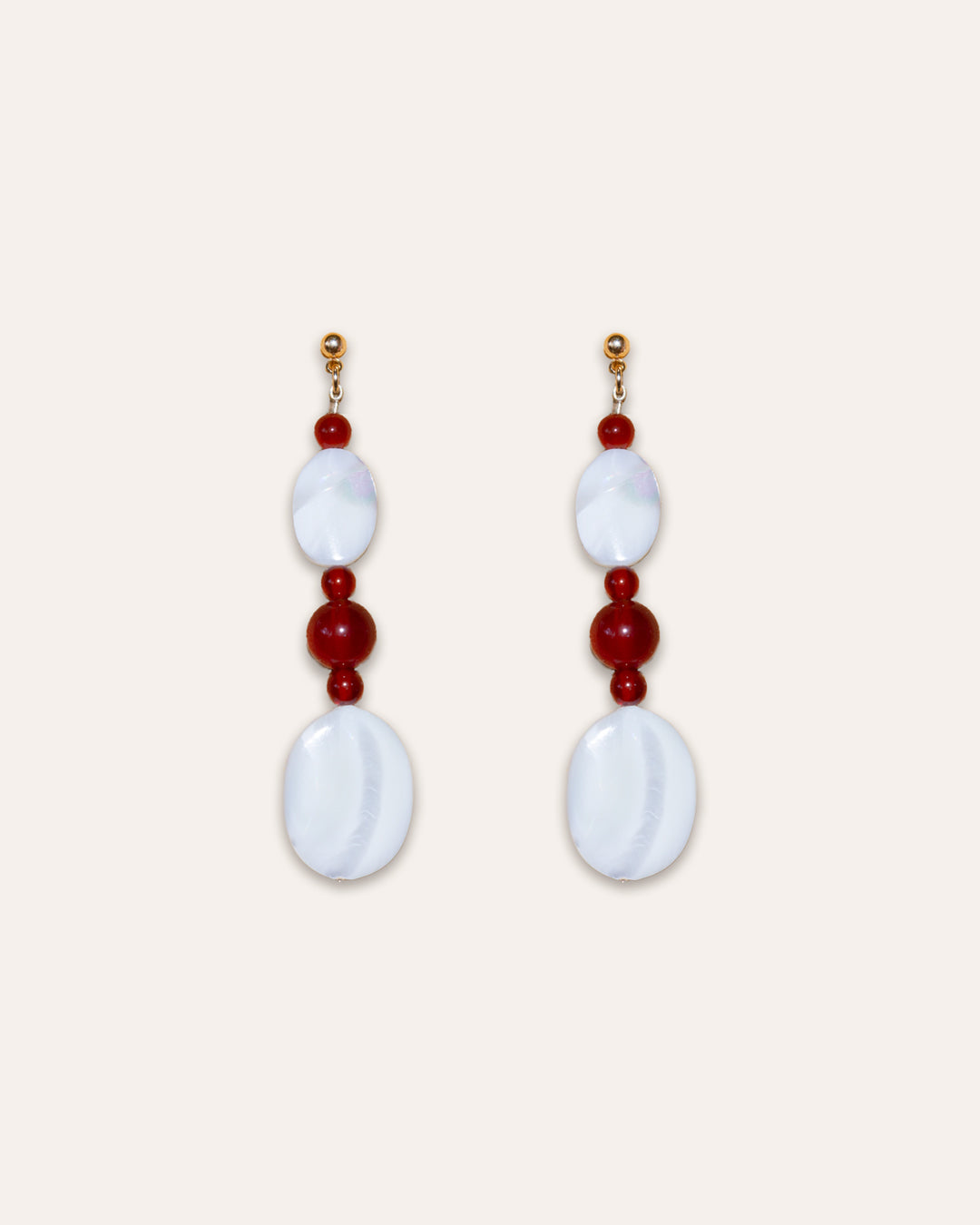 Studio shot of Moonlit Earrings in Red Agate and Mother of Pearl.