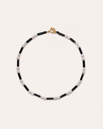 Rhythm Onyx Necklace featuring Freshwater Pearls and onyx beads, a stylish accessory for everyday wear, perfect for fashion enthusiasts and those seeking elegance in simplicity. 