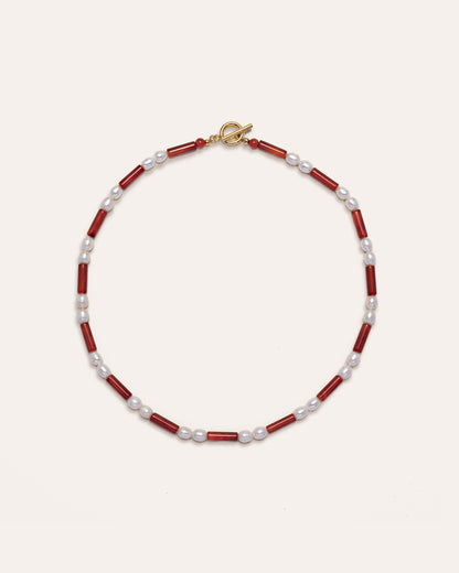 Red and gold freshwater pearl necklace, Rhythm, features red agate beads for a unique fashion accessory. 