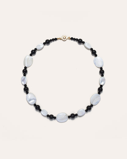 Sonata Moonlit Onyx necklace features mother of pearl (MOP) and onyx stones, creating an elegant piece of accessories. 
