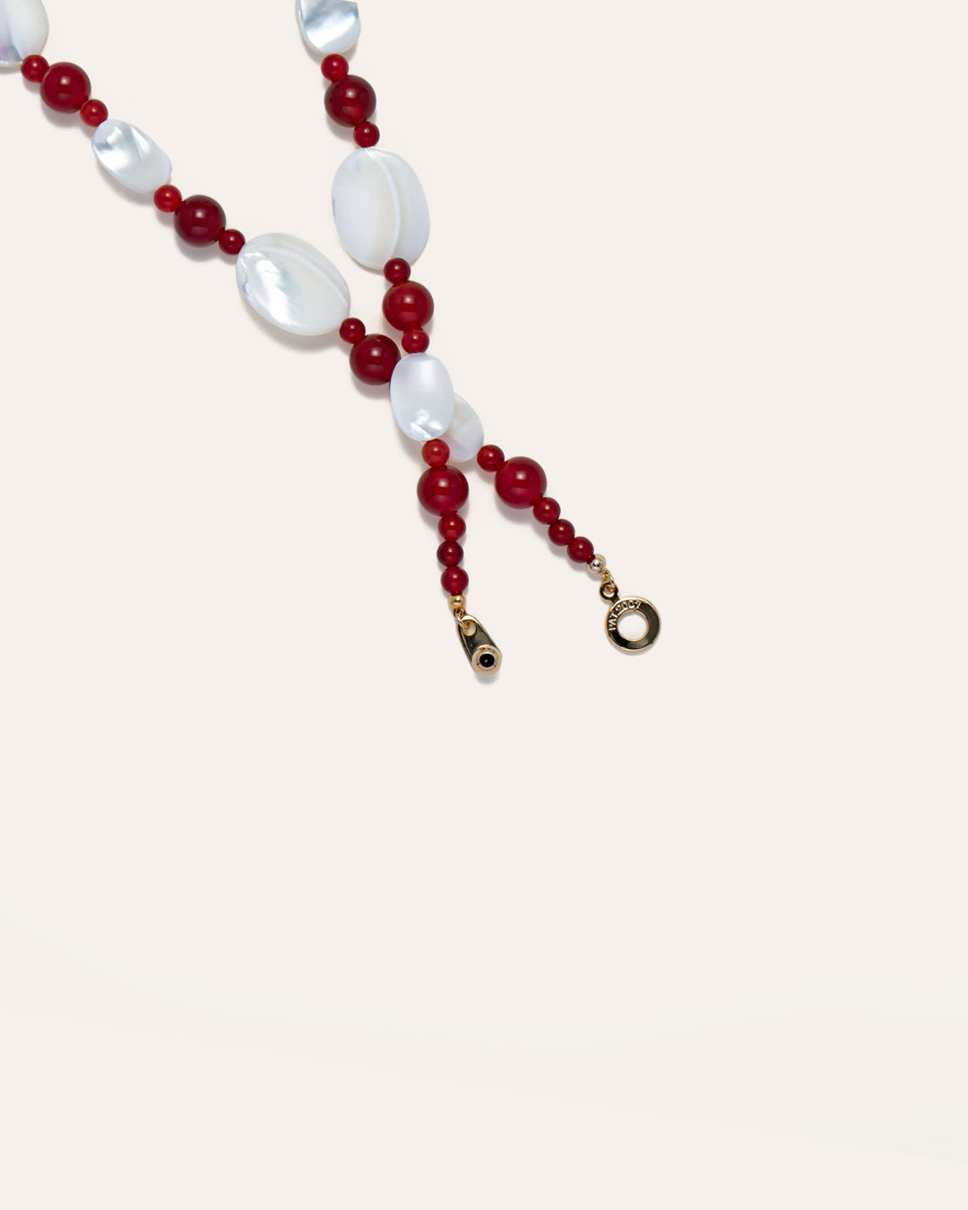 Sonata Moonlit Necklace with Red Agate beads, featuring lustrous mother of pearl (MOP) stones on a gold-tone chain, handcrafted for elegance and sophistication.