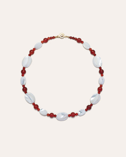 Mother of pearl and red agate Sonata Moonlit Necklace, elegantly showcasing natural stone beads in a necklace setting.