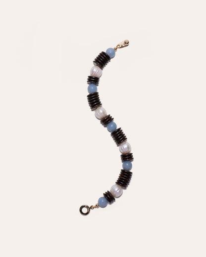 Toes-In-Sand bracelet with coconut disc beads, angelite, and freshwater pearls.