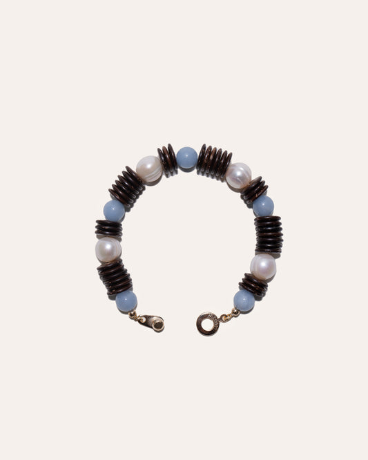 Toes-In-Sand bracelet with coconut disc beads, angelite, and freshwater pearls.
